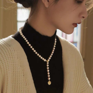 Freshwater pearl necklace	,	plated with 18k gold	,	Pearl Size :	7-8mm	,	Pearl Necklace Length :	50cm	(	MJ-2018	)